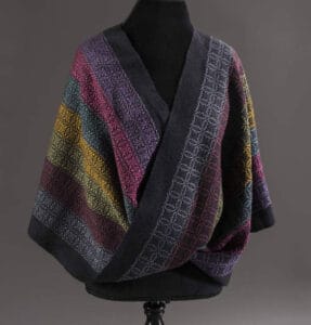 shawl with multicolored stripes is an example of supplemental warp