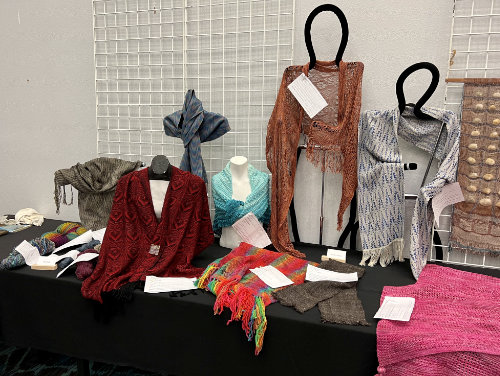Knit and Woven Items on the 2023 Fiber Exhibit Table